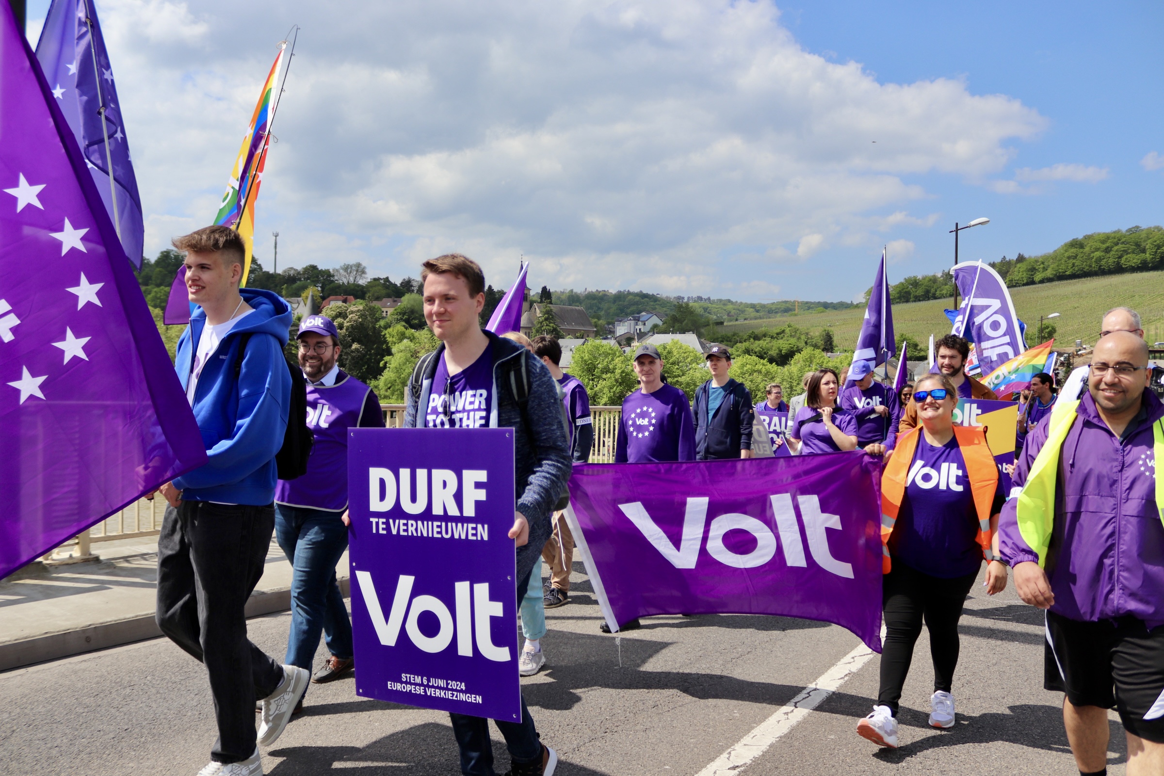Volters marching across the bridge at Schengen